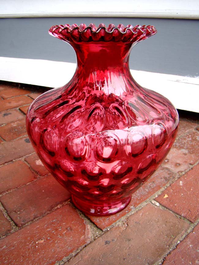 A large hand blown Cranberry glass vase made by the Pilgrim Glass Co. of W. Virginia circa 1968